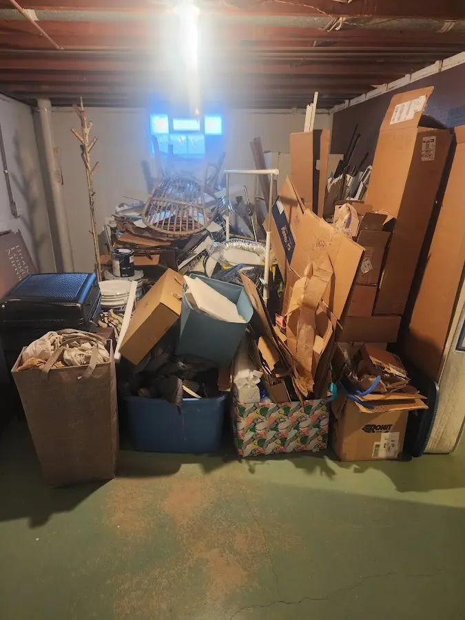 Roll-off dumpster container at job site for 2 Yard Dumpster Rental in Riverdale